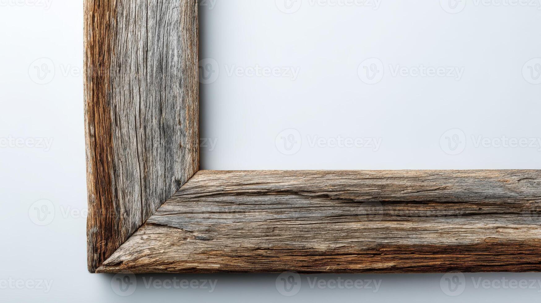 Rustic wooden frame corner on white background, weathered reclaimed wood texture, blank space for text or image photo