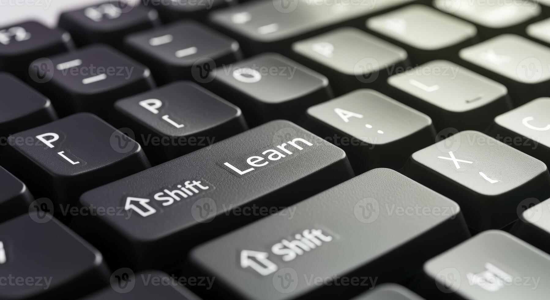 Close-up of a Black Computer Keyboard with Learn key, showcasing online education concept photo