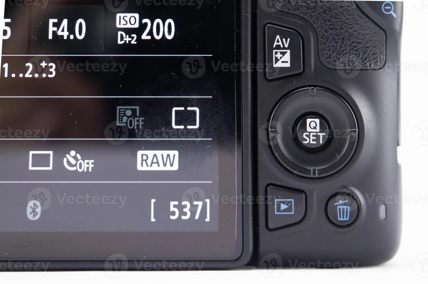 Camera LCD Screen Displaying Settings - Aperture ISO RAW Format and Image Count. photo