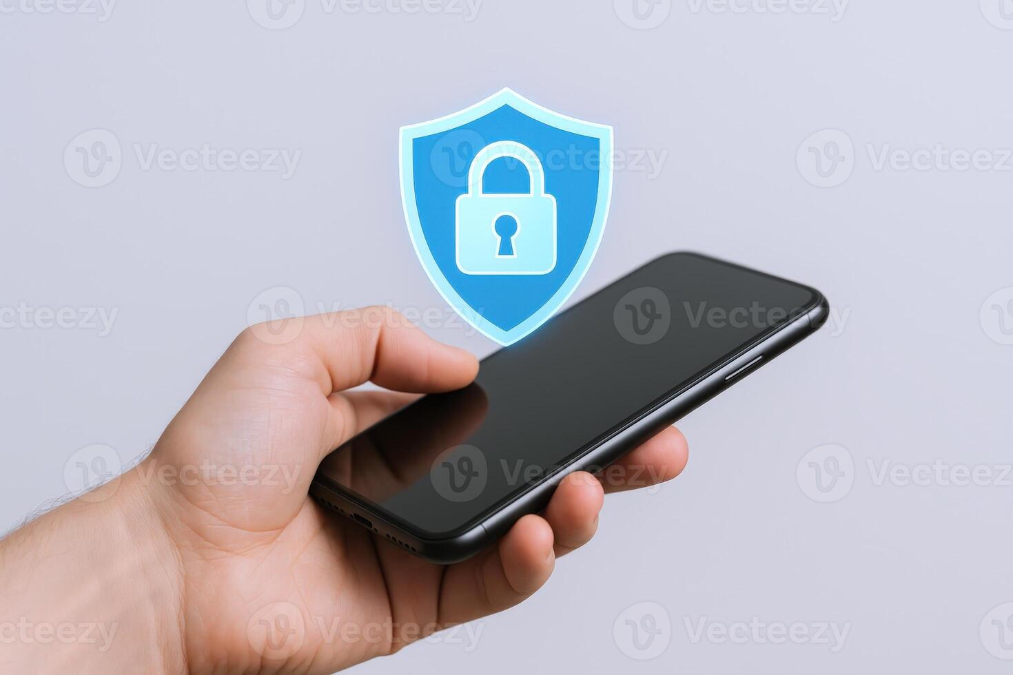 Mobile Security Hand Holding Smartphone with Digital Shield Lock Overlay for Secure Access and Data Protection photo