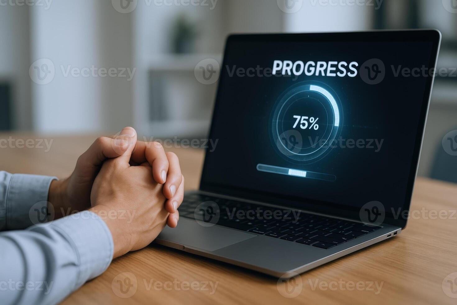 Progress Indicator on Laptop Display with Hands, Representing Task Completion and Project Management photo