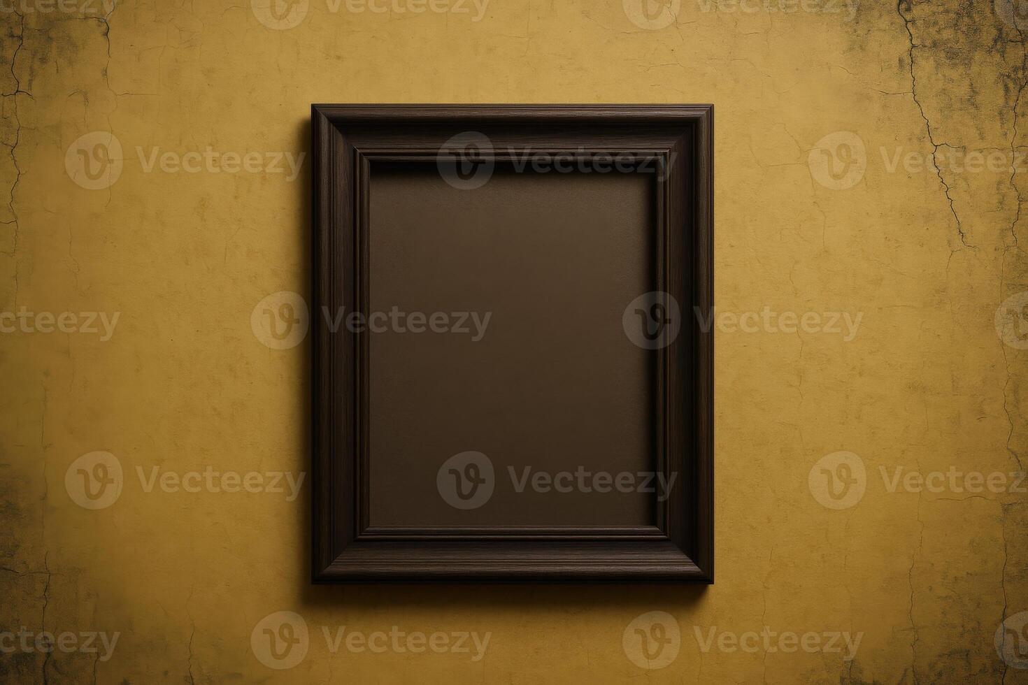 Empty Dark Wood Picture Frame Hanging on Textured Yellow Wall, Ideal for Mockups and Display photo