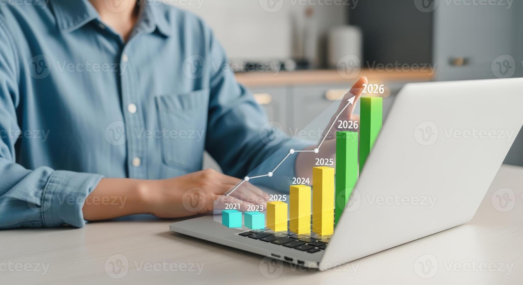 Analyzing Business Growth Person Using Laptop with Rising Graph Overlay for Data-Driven Decision Making photo
