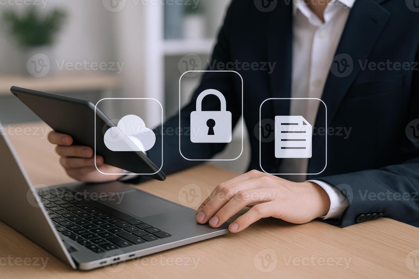 Data security and cloud computing concept with laptop, tablet and digital icons overlay on the working desk photo