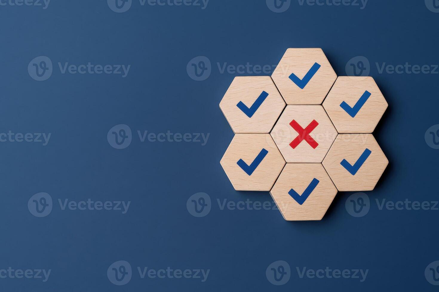 Concept of success and failure shown with check marks and cross on hexagon tiles photo