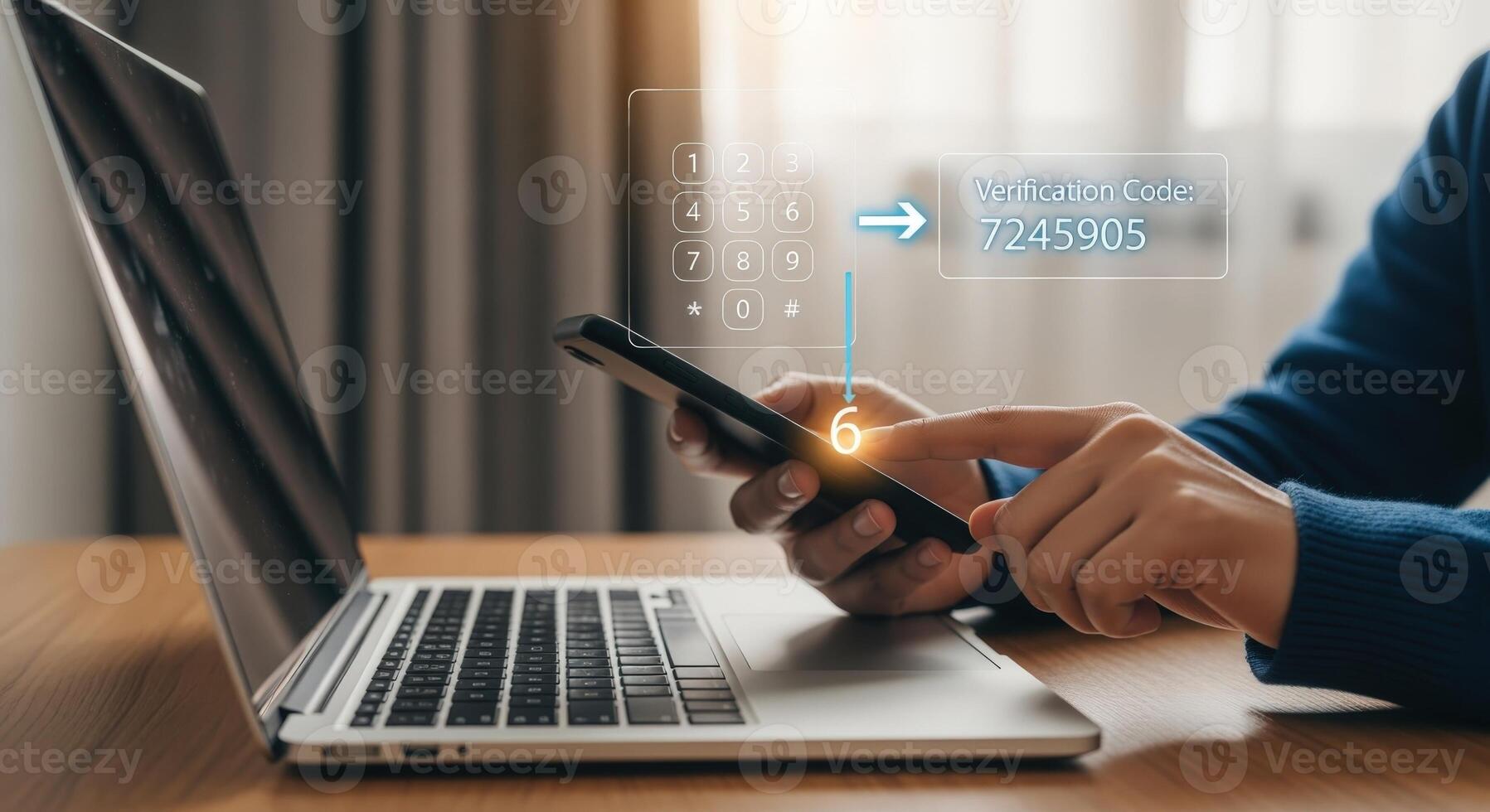 Person using two factor authentication code on smartphone with laptop for enhanced security photo