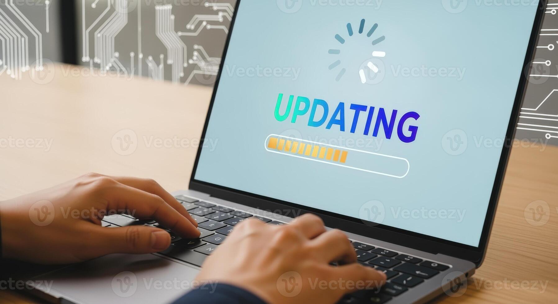Laptop Screen Displaying Software Update Progress, Hands Typing on Keyboard, Technology Concept photo