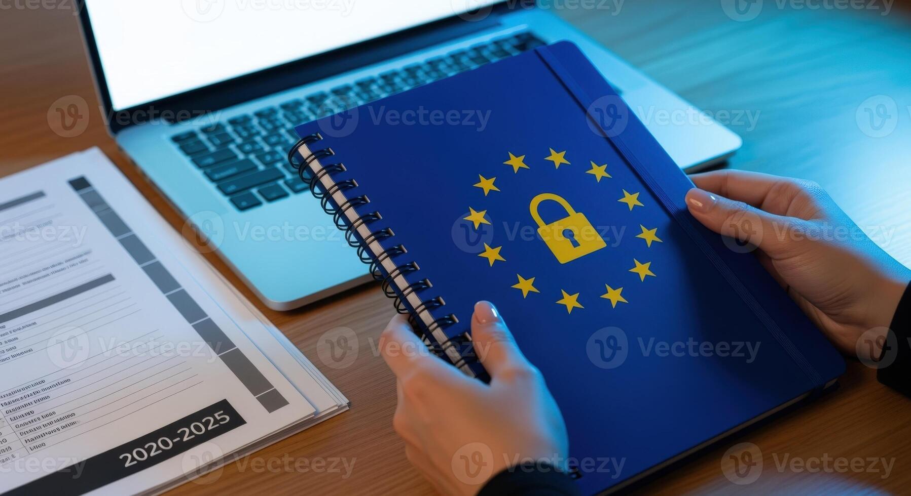 Data Protection Compliance Person Holding GDPR Guidelines Notebook, Security Lock Icon, Computer and Papers photo