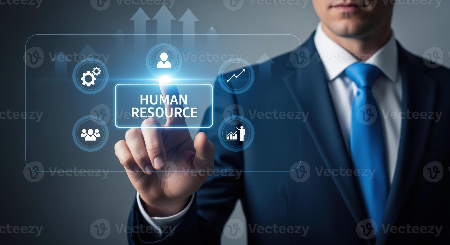 Professional businessman pressing virtual screen displaying human resources management and development technologies for HR solutions photo