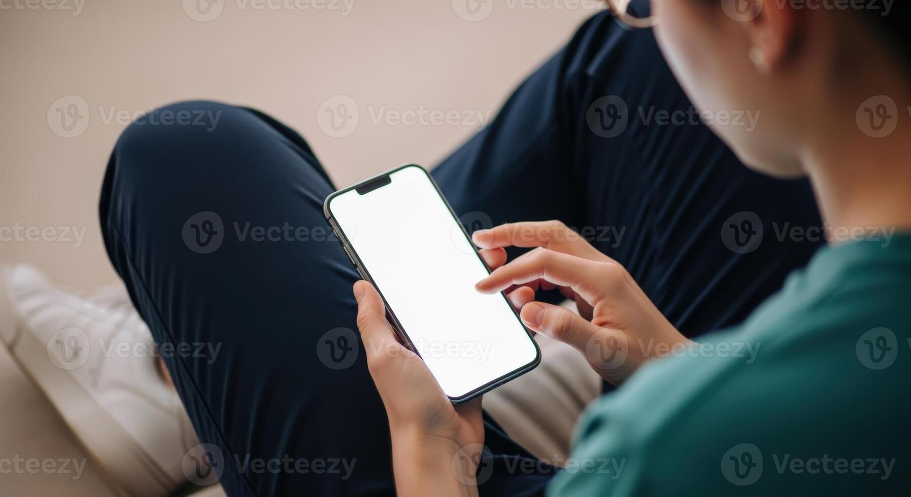 Person Using Mobile Phone with Blank Screen for App UI and UX Presentation photo