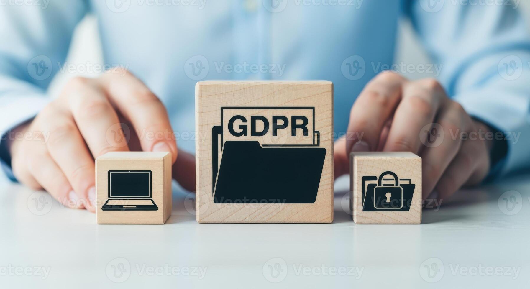 GDPR Concept with Wooden Blocks Showing a Folder, Laptop, and Lock on a Tabletop photo