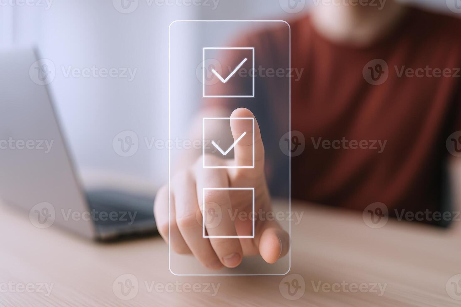 Person Interacting with a Digital Checklist on Transparent Screen Displaying Task Completion and Business Productivity photo