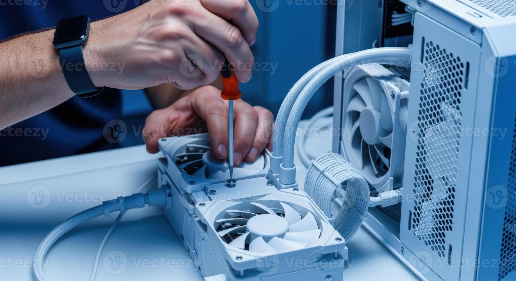 Computer Technician Assembling Water Cooling System with Screwdriver, Ensuring Optimal Performance and Longevity photo