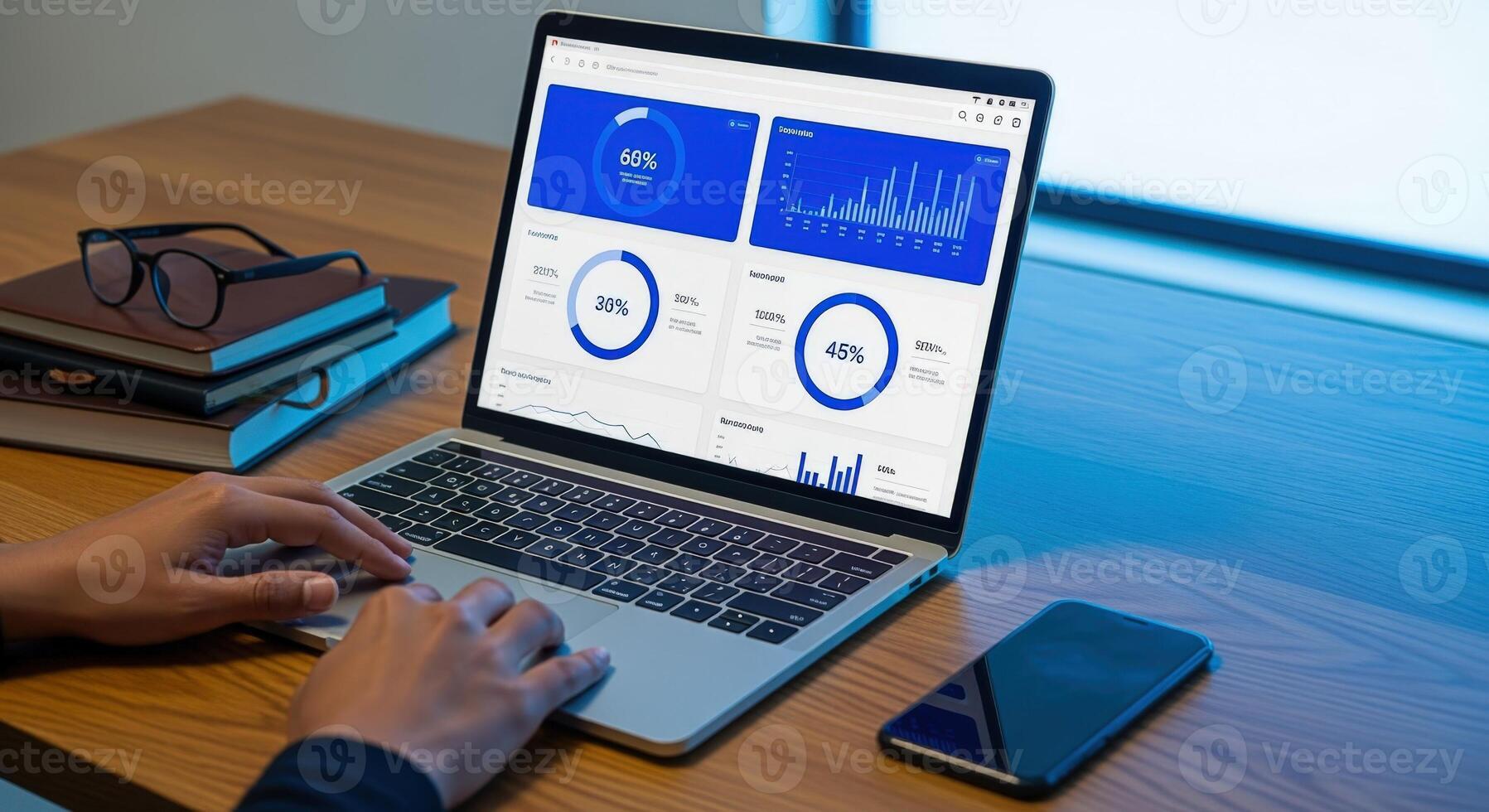 Business professional analyzing data dashboards on a laptop, optimizing performance and tracking growth metrics in a modern office photo