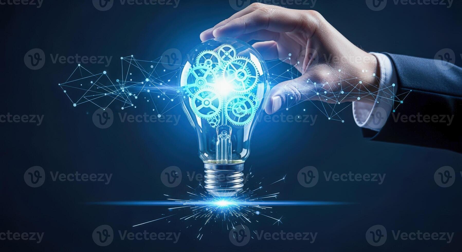 Hand Holding Glowing Lightbulb with Gears - Symbol of Innovation and Creative Problem Solving photo