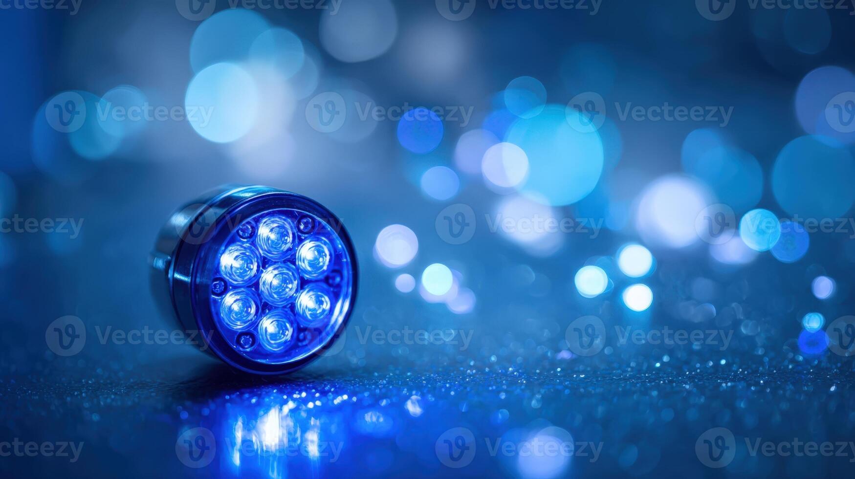 Macro Shot of a Powerful Blue LED Light, Close-up of Futuristic Lighting Device with Bokeh Effect photo