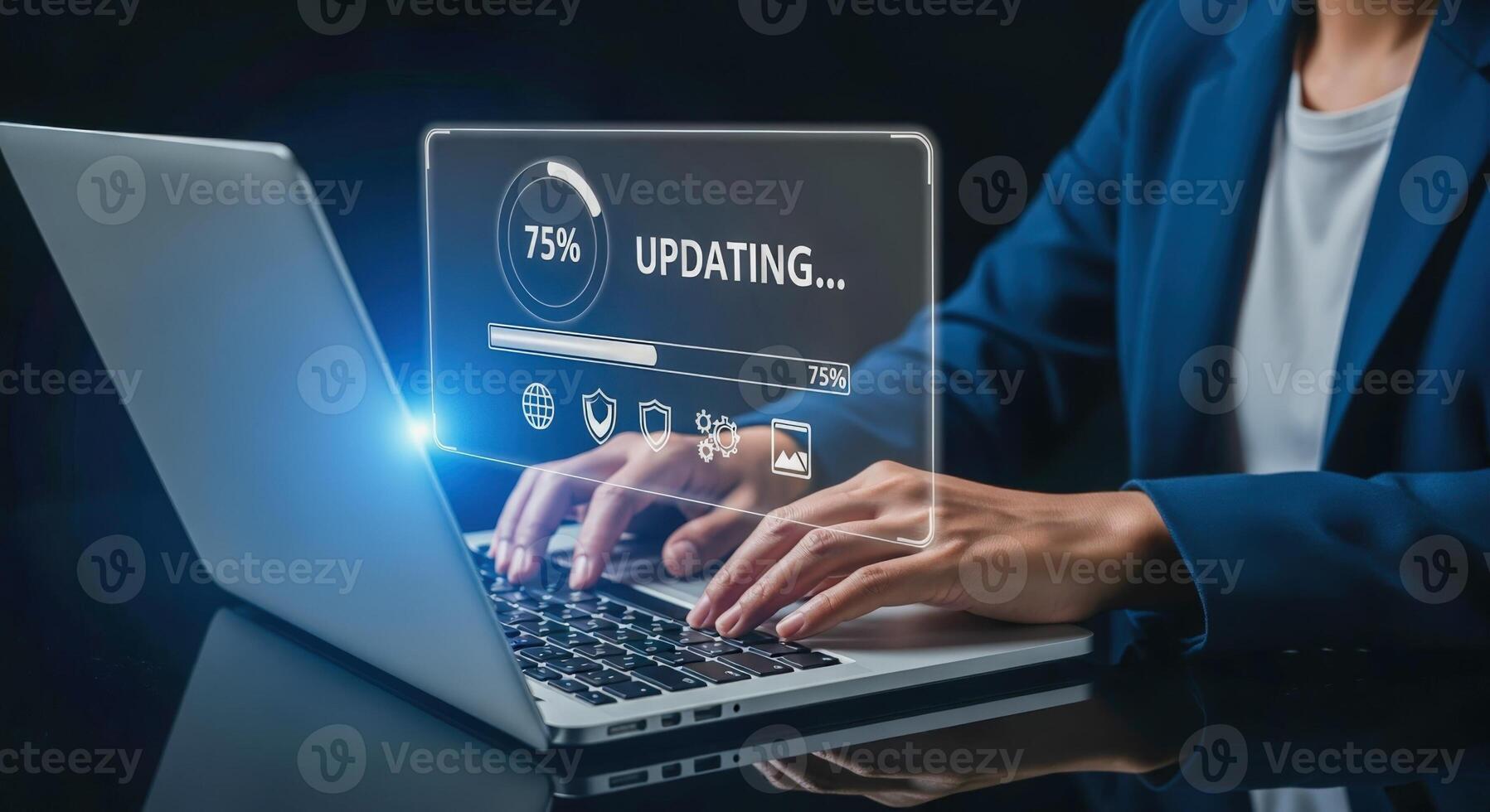 Software Upgrade in Progress Displayed Over Laptop with Person Typing, Showing System Update Installation photo