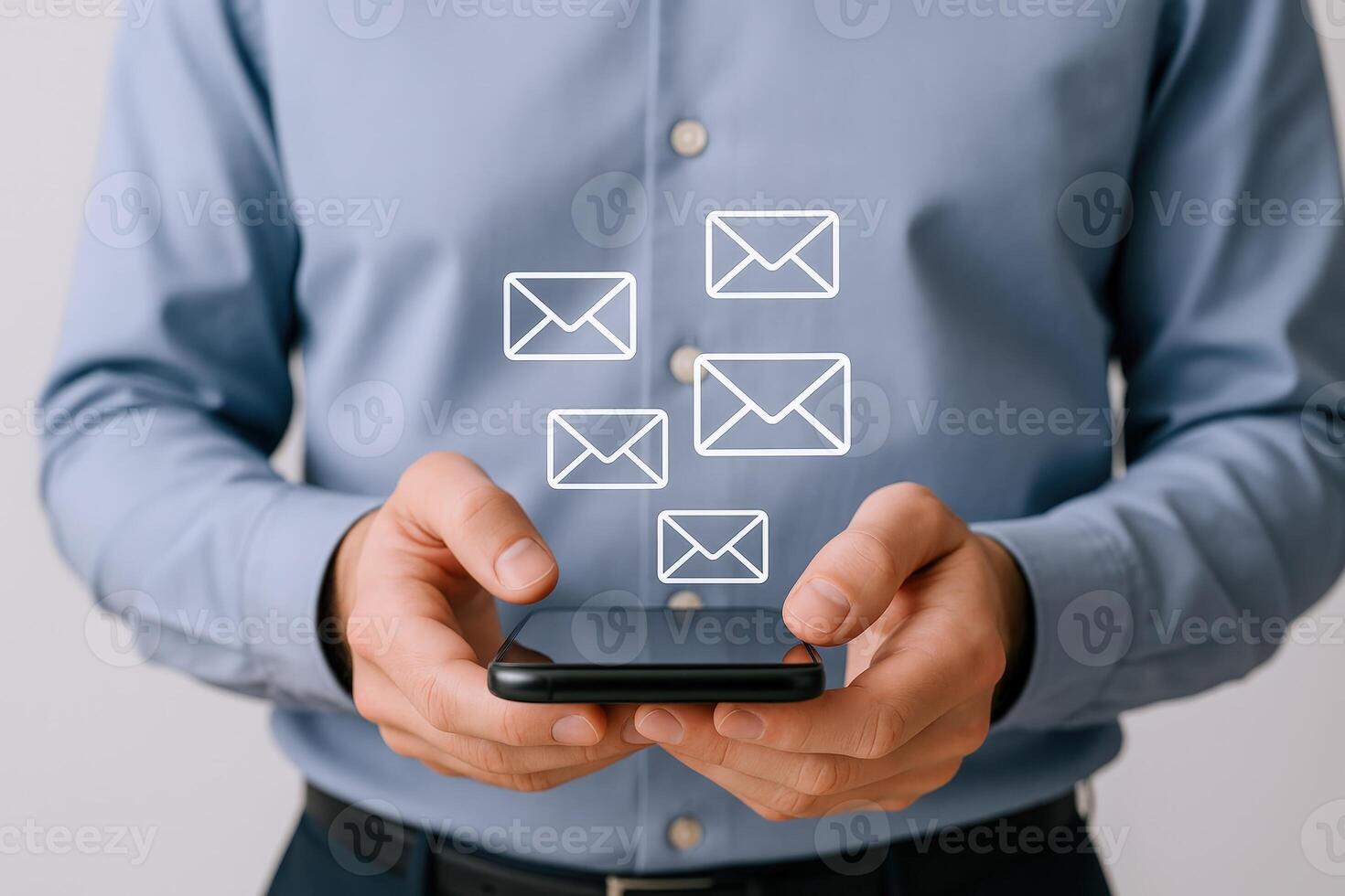 Businessman managing emails on a mobile device, demonstrating digital communication and connection in the modern workplace photo