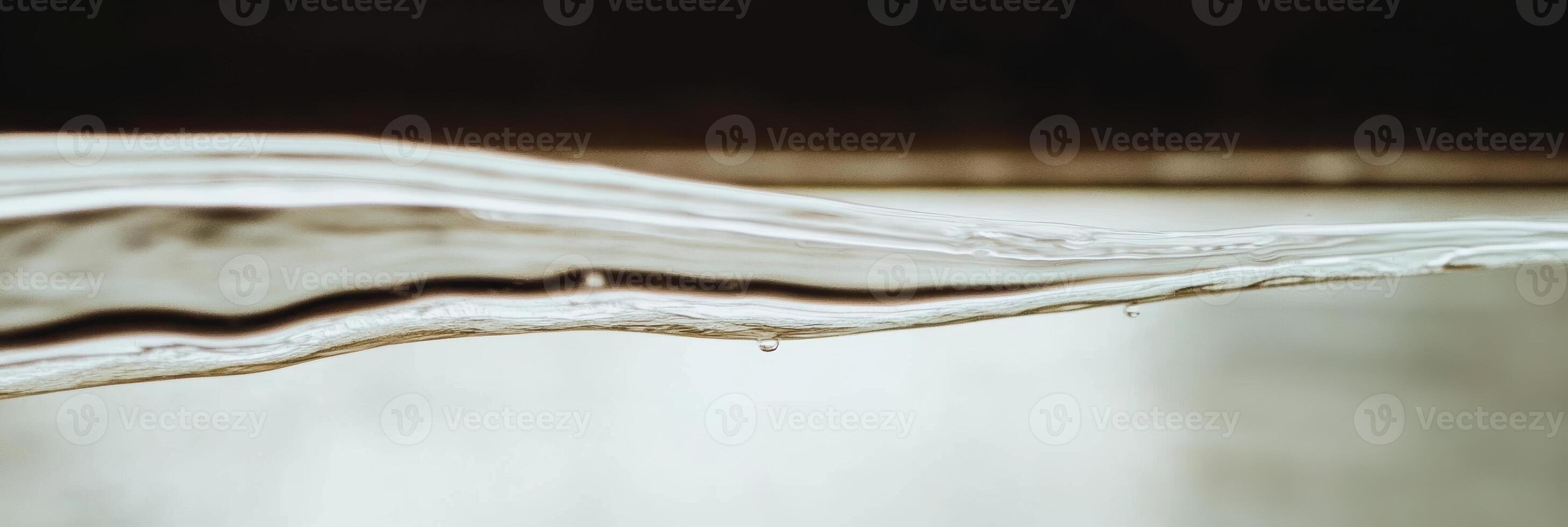 Fluid waves create mesmerizing patterns in a tranquil stream of water photo