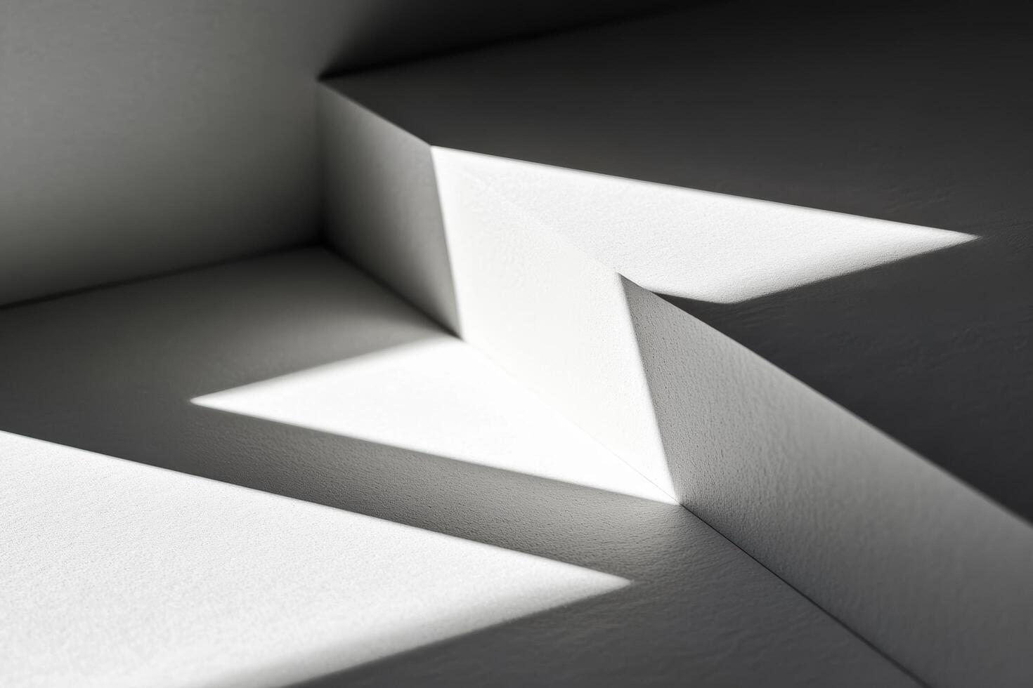 Shadows and light create geometric patterns in a minimalist space photo