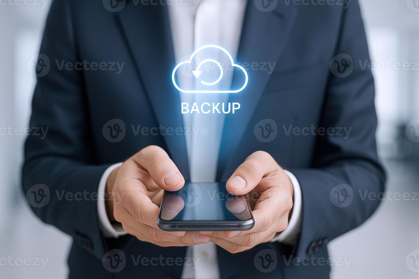 Smartphone data backup service, man holding mobile phone with cloud backup icon for security photo