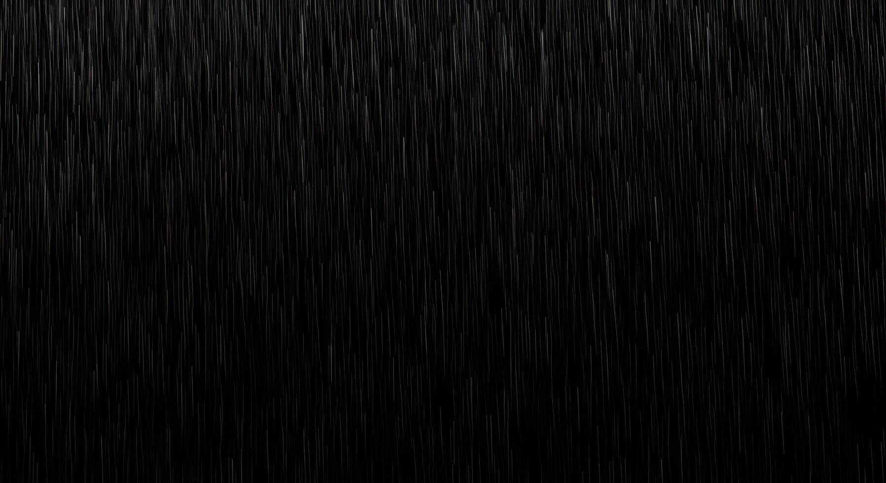 Abstract digital animation of heavy rain or falling particles creating a dynamic textured overlay on a deep black background, perfect for atmospheric visual effects, graphic design, and production photo