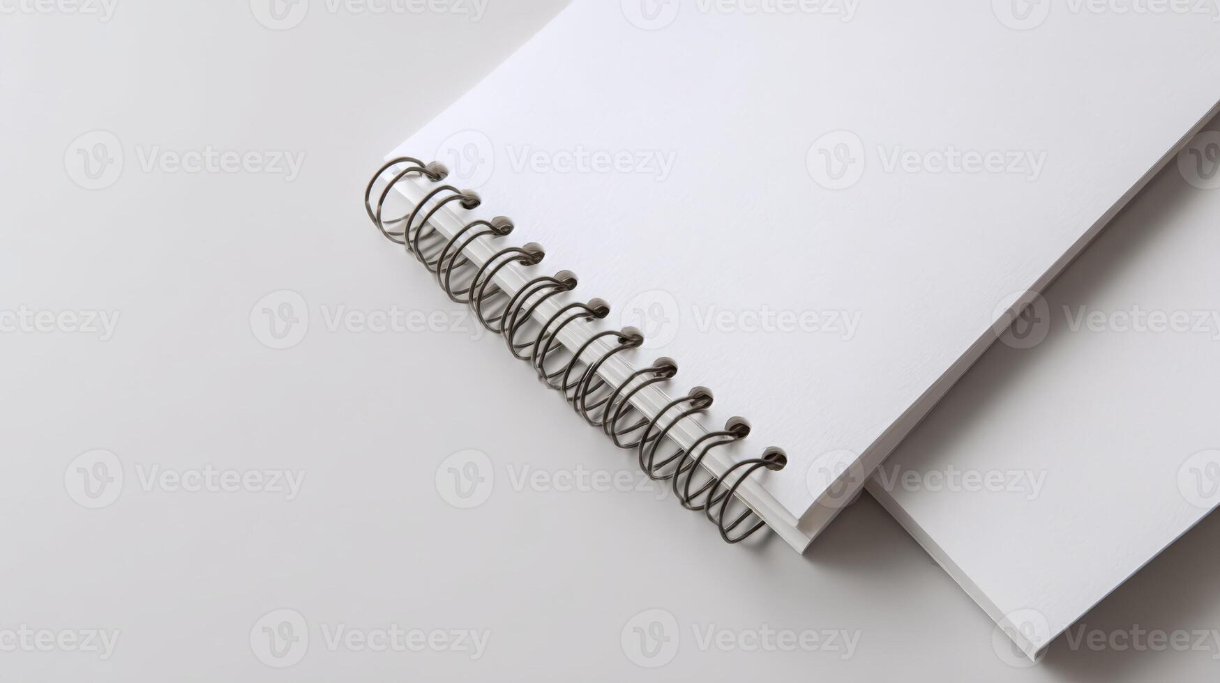 Blank Spiral Notebook Mockup on White Background - Minimalist Design for Creative Projects and Presentations photo