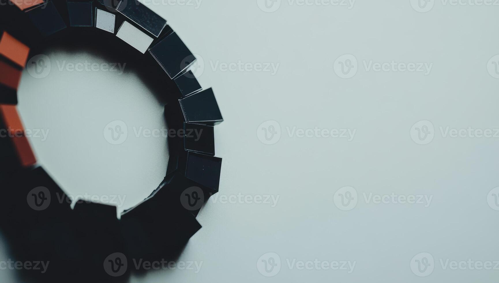 Colorful geometric shapes arranged in a circular pattern on a light background photo