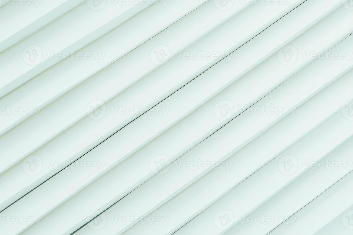 Diagonal lines create a modern texture on a white surface photo