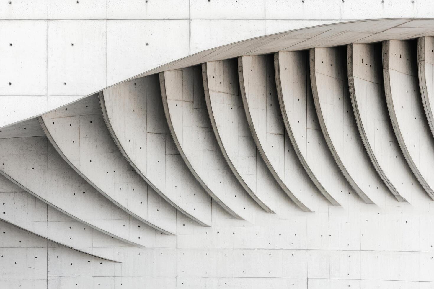 Architectural concrete design with curved lines and textures in modern structure photo