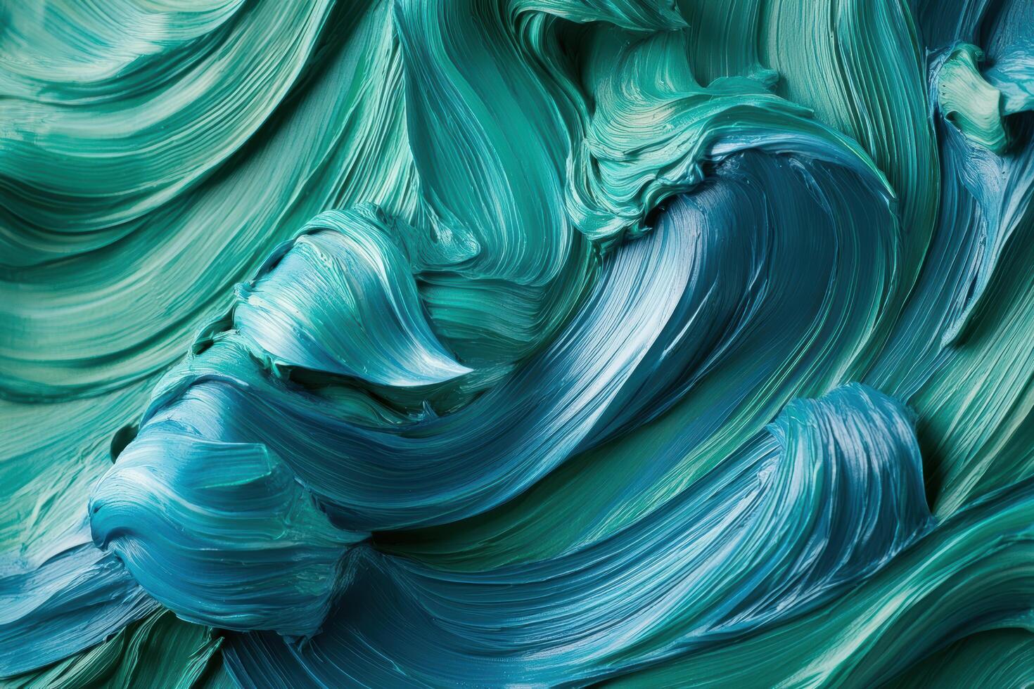 Colorful swirls of oil paint create a vivid abstract texture on canvas photo