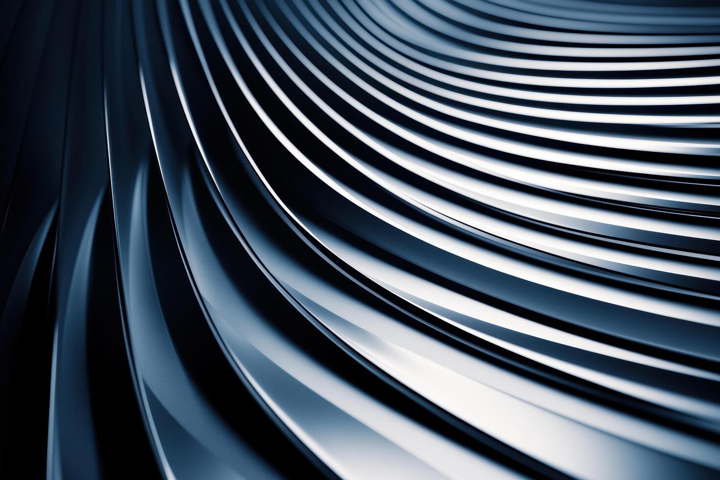 Curved metallic surface reflecting light in an abstract design photo