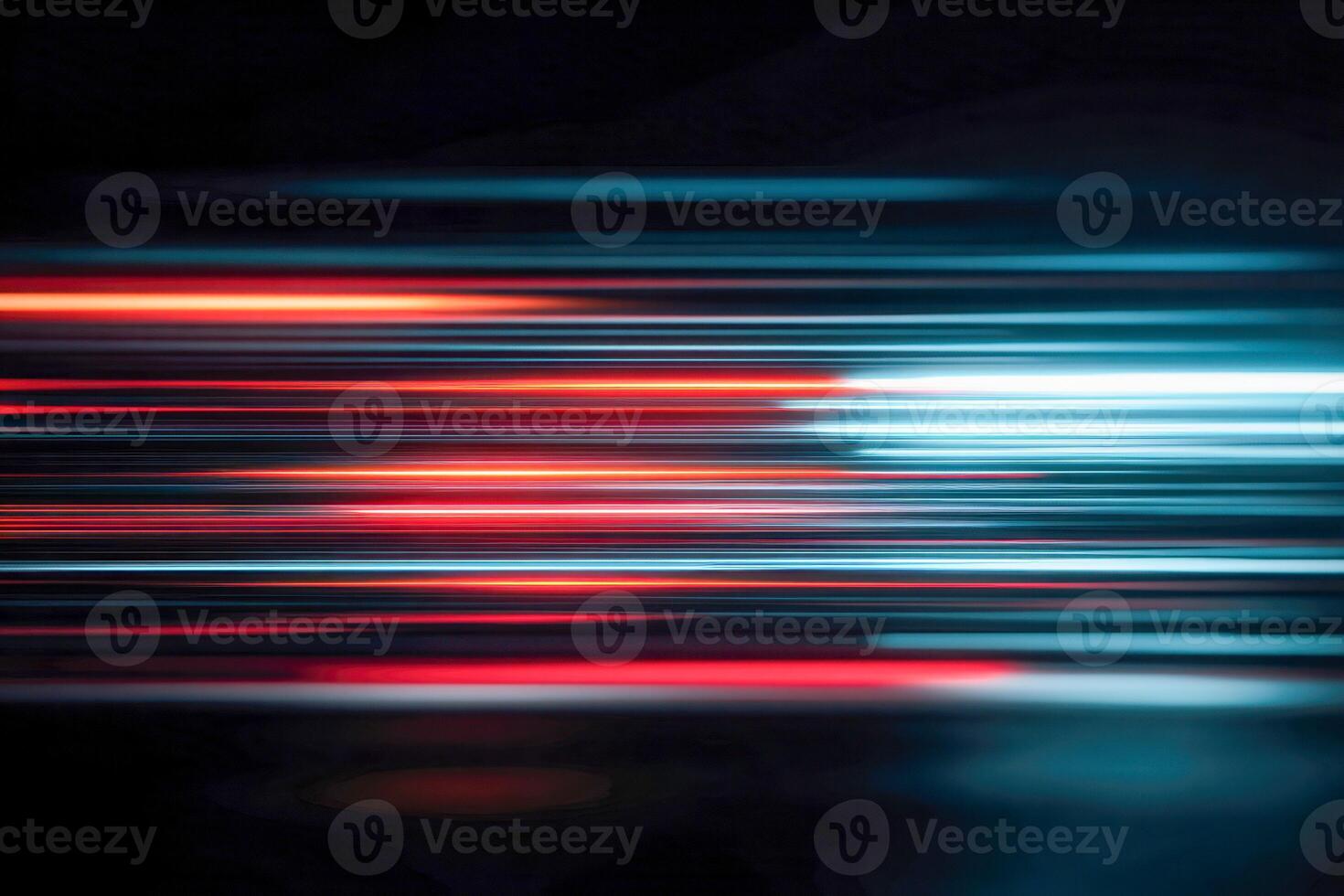Vibrant streaks of red and blue light trails creating a dynamic motion effect against a dark background symbolizing speed and futuristic technology concepts photo