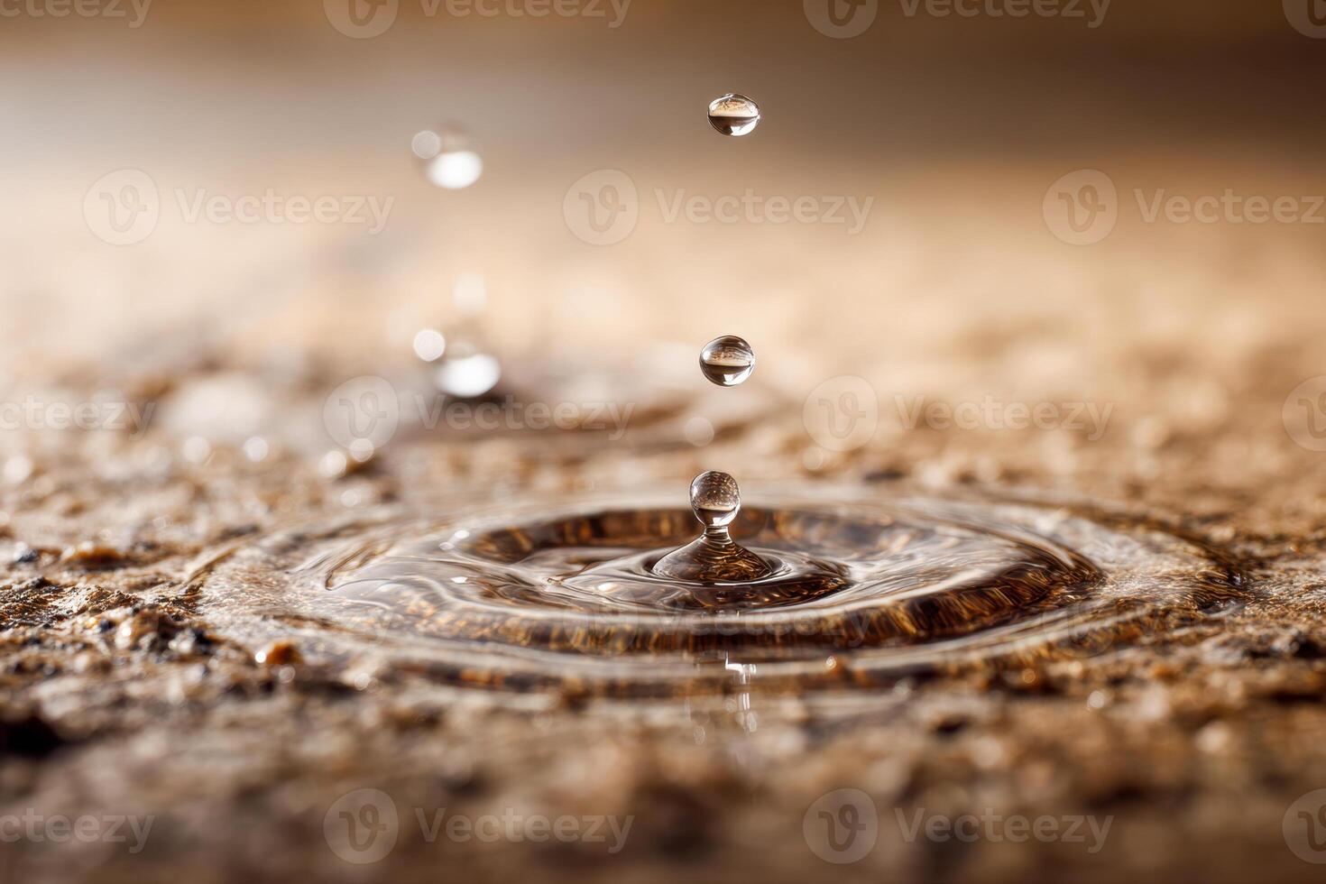 Close-up of transparent water droplets falling and creating ripples on a textured surface with soft natural lighting and a blurred background effect photo