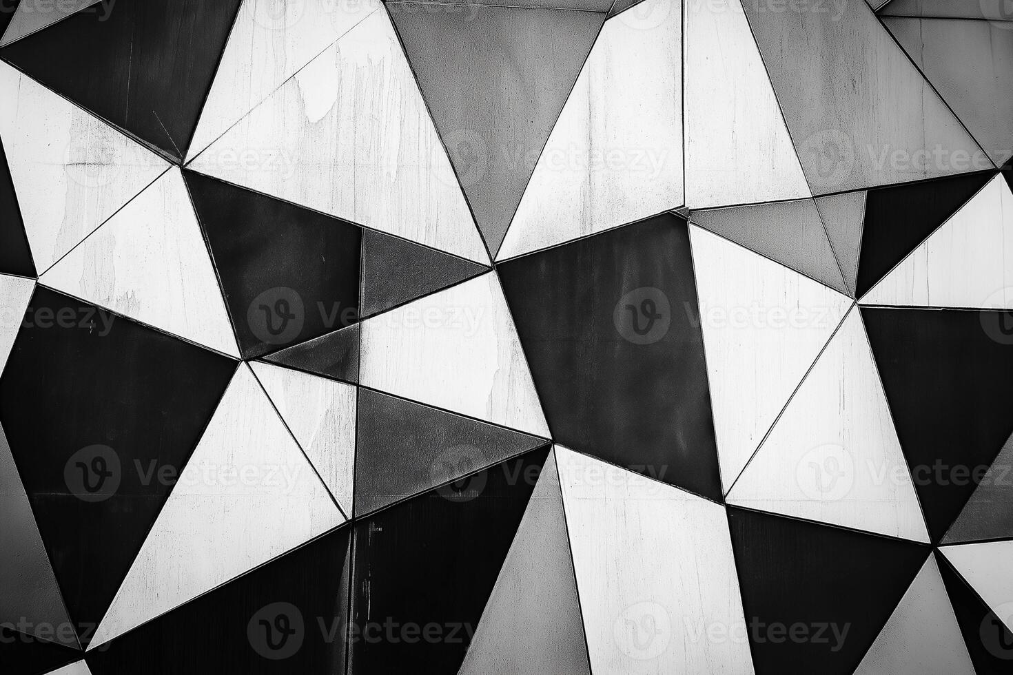Dynamic geometric patterns create a striking monochrome wall design. photo