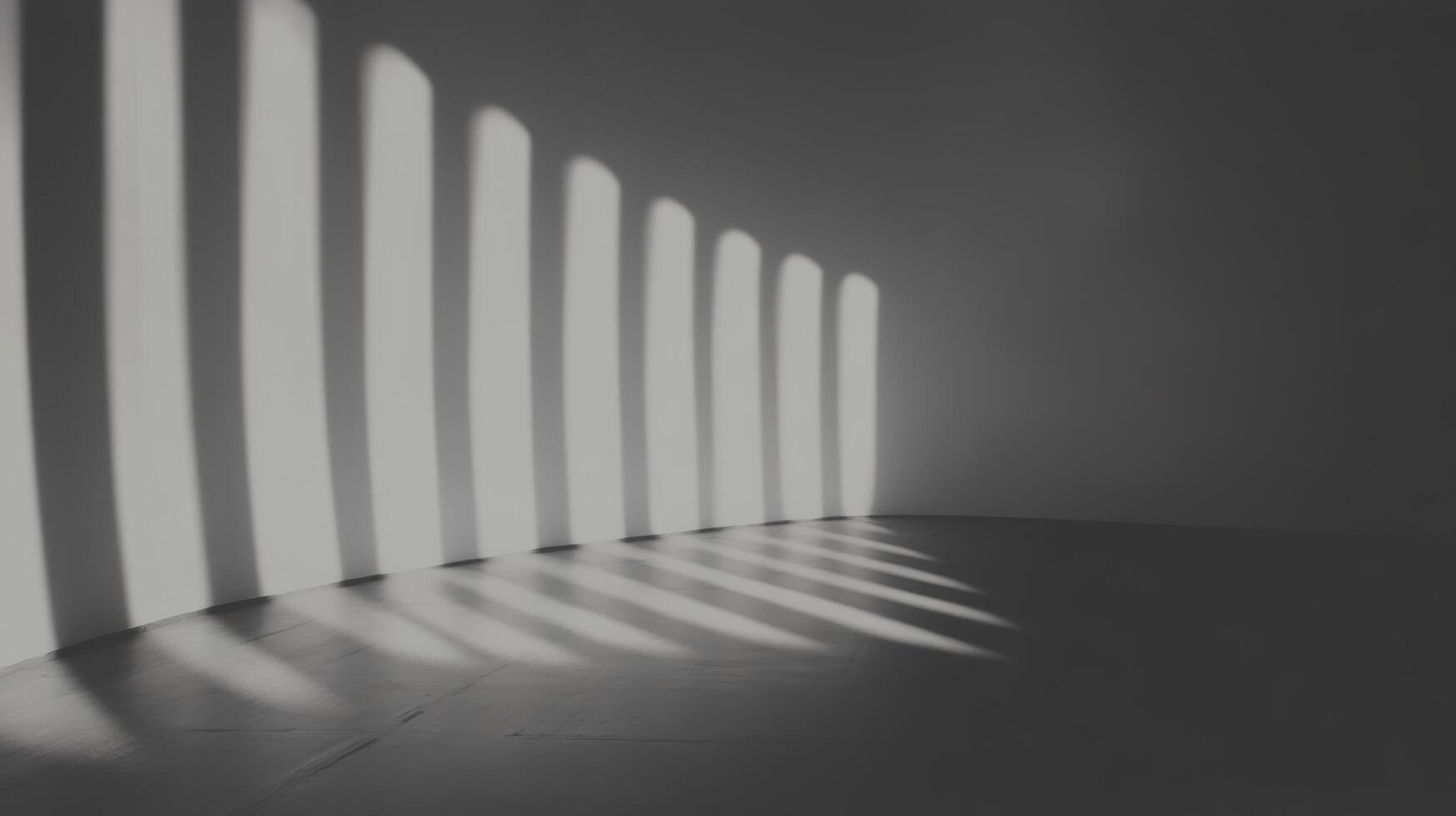 Shadows and light patterns creating a serene atmosphere in a curved room photo