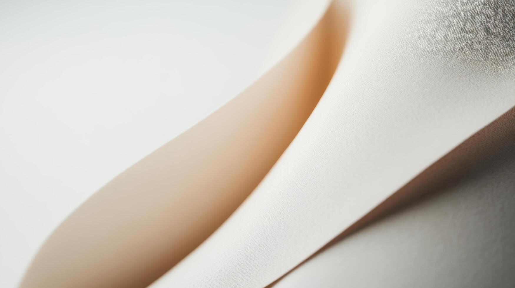 Elegant curves of soft fabric against a light background creating a serene tone photo