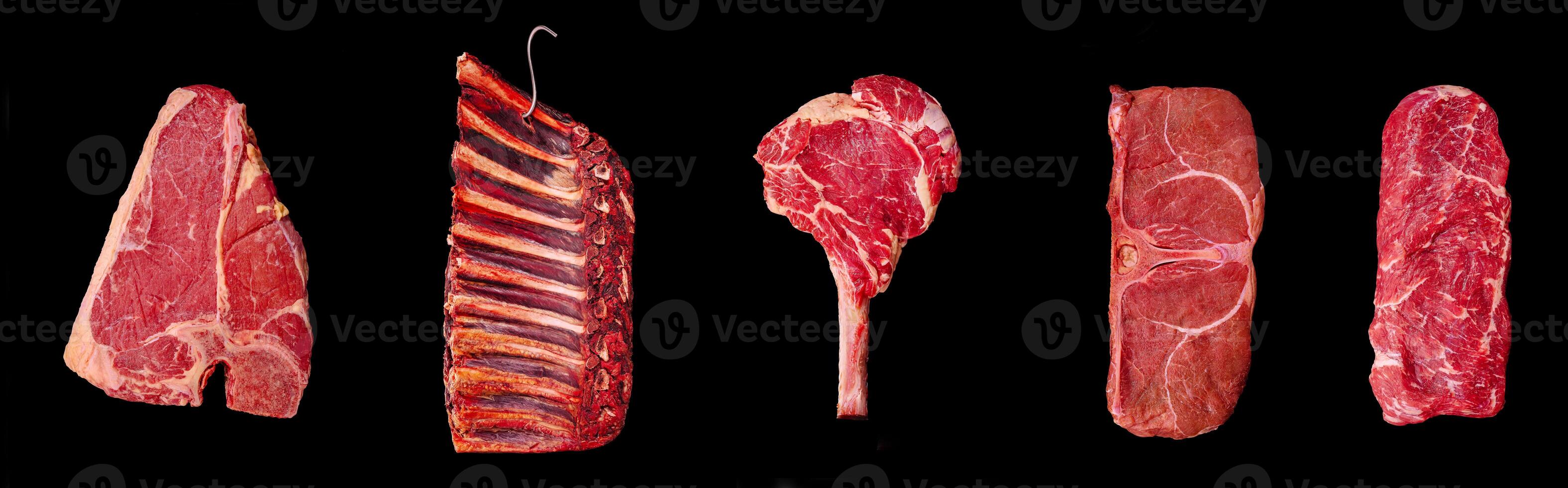 Different cuts of beef displayed on a black background for culinary presentation photo