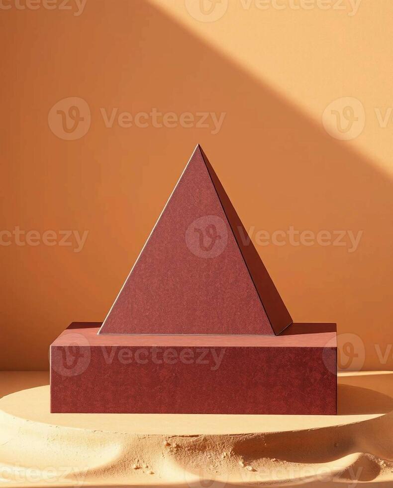 Geometric pyramid and rectangular pedestal display with warm sunlight and shadow play photo