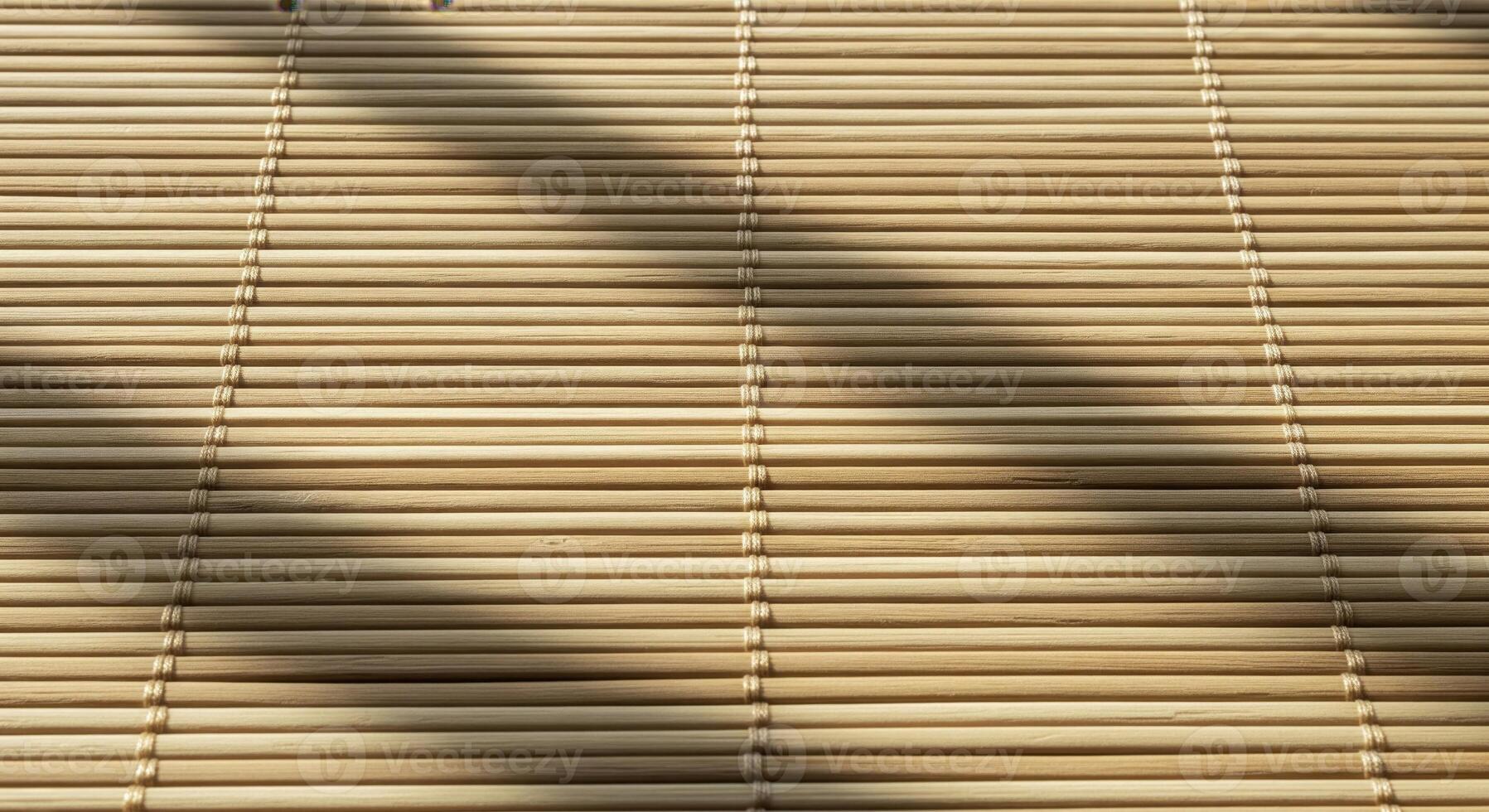 Bamboo Mat With Horizontal Slats And Diagonal Shadows Creating Warm Textured Minimalist Composition photo
