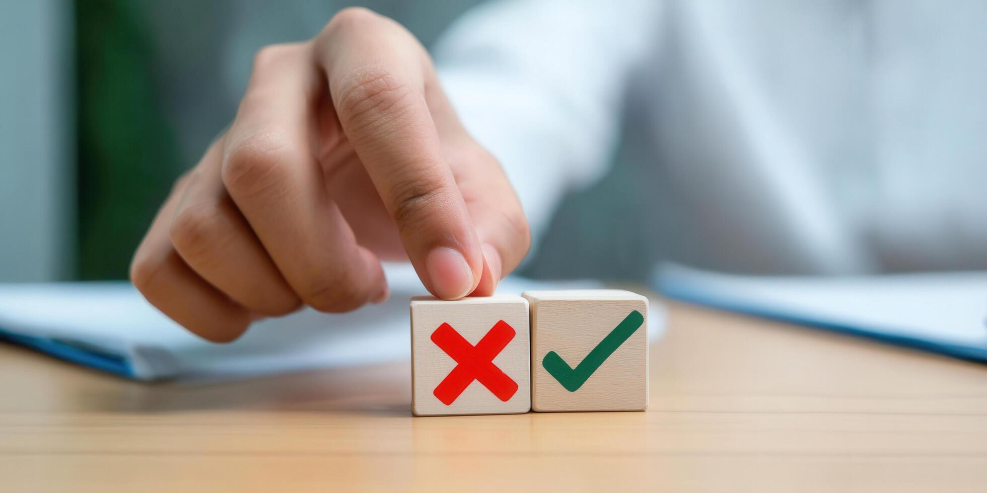 A person making a decision between the right and wrong choices, signified by a checkmark. photo