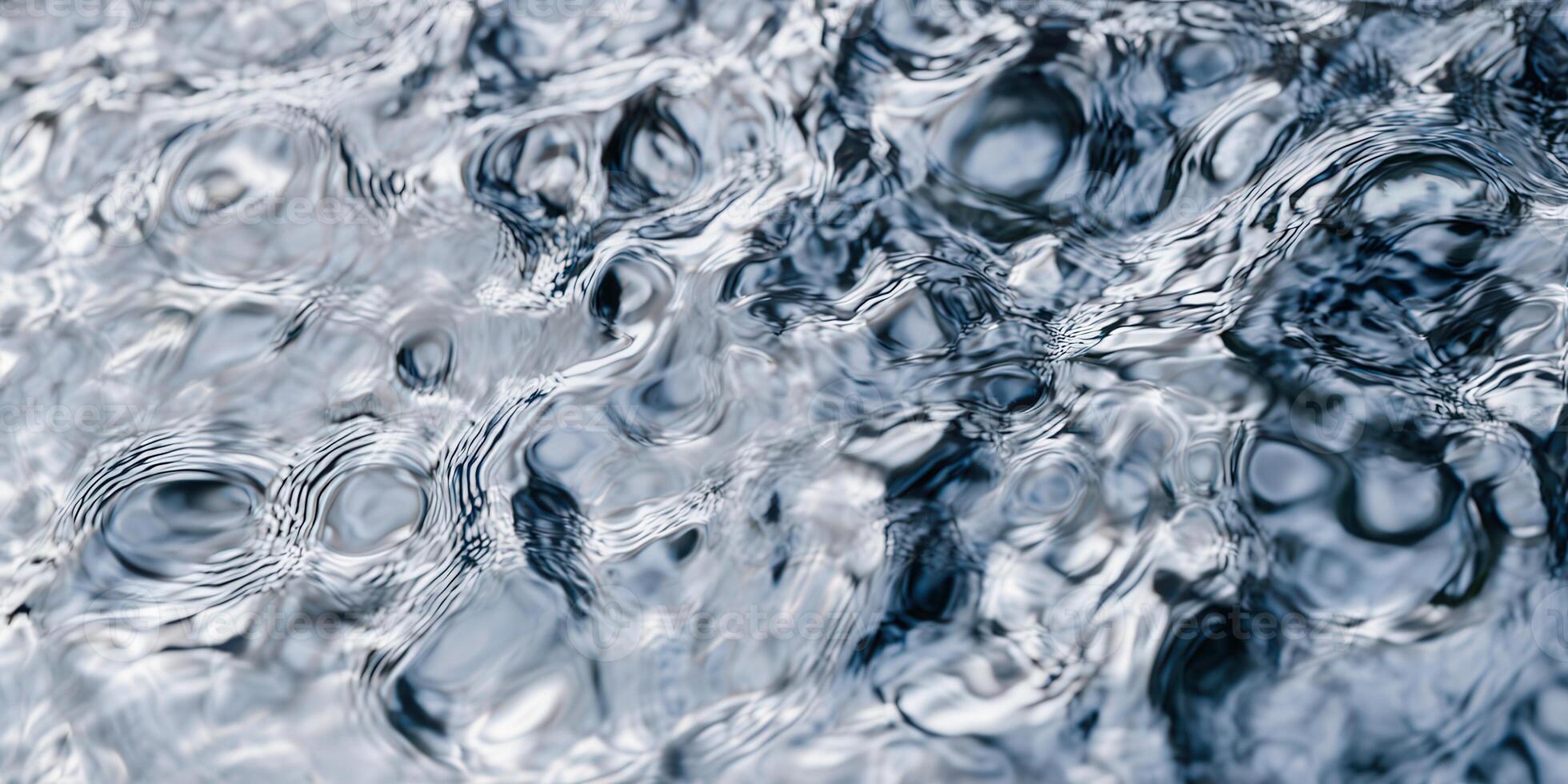 The image captures the gentle movement of water, creating intricate patterns and reflections. photo
