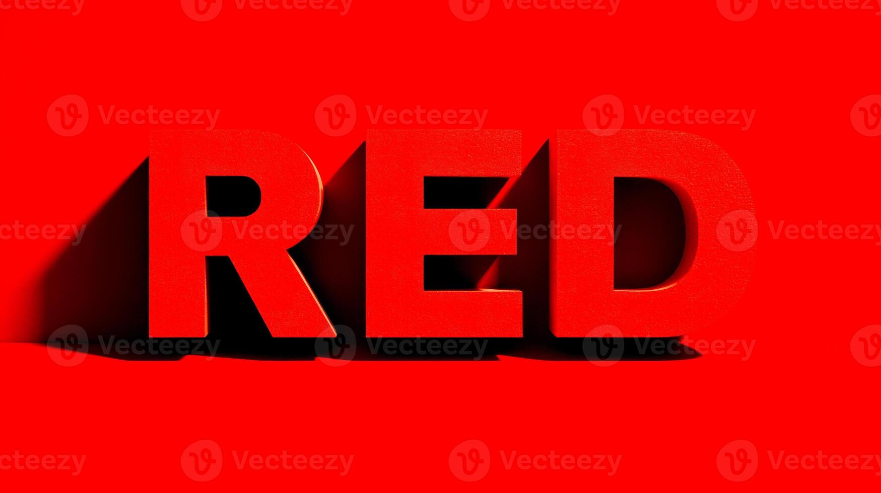 Bold three-dimensional red letters casting long shadows on a vibrant solid red background creating a striking minimalist design concept for attention and impact photo