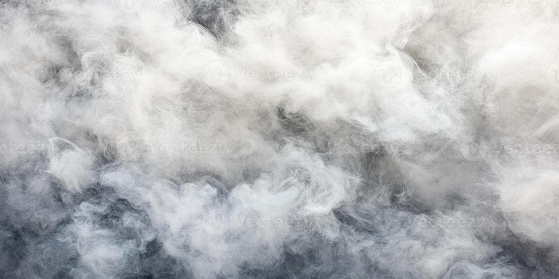 Thick white fog rolls across a dark surface in a mystical setting photo