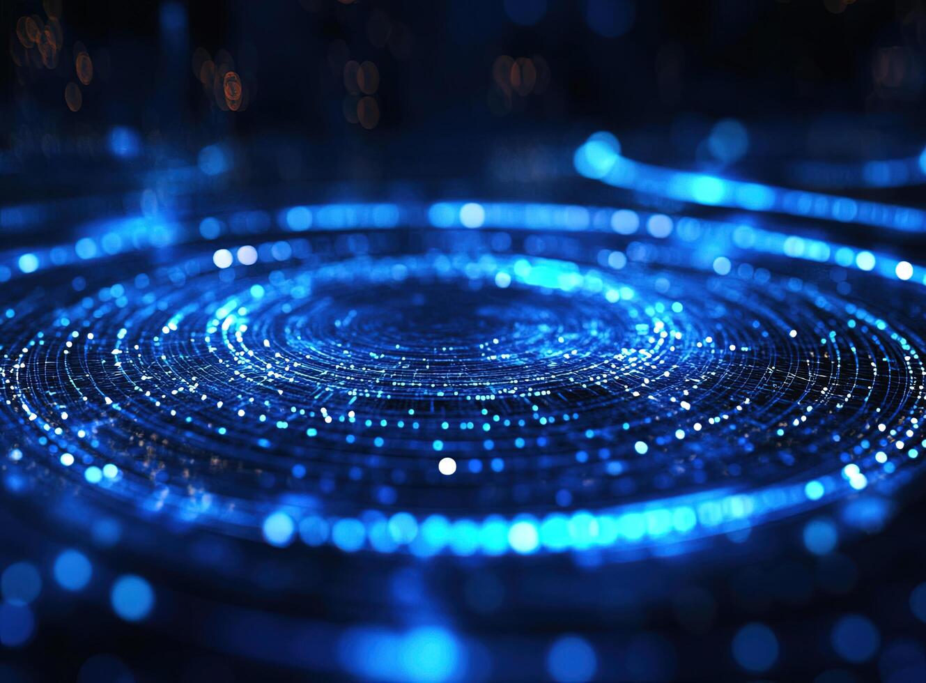 Luminous blue dots arrange into swirling concentric circles, creating a technological and abstract pattern photo