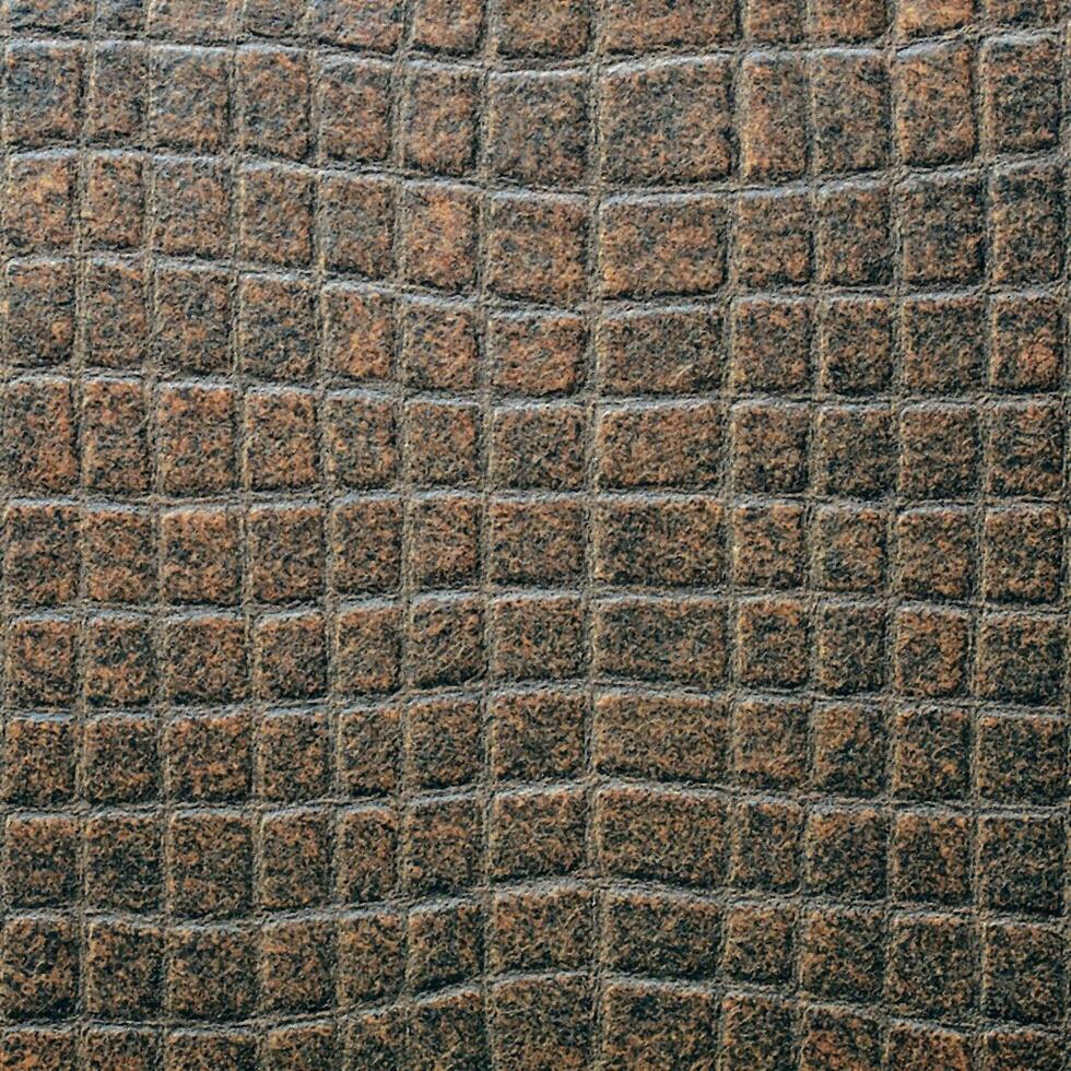 Brown leather crocodile style grid pattern textured material for bags wallets belts and upholstery durable finish premium quality sample classic structured look photo