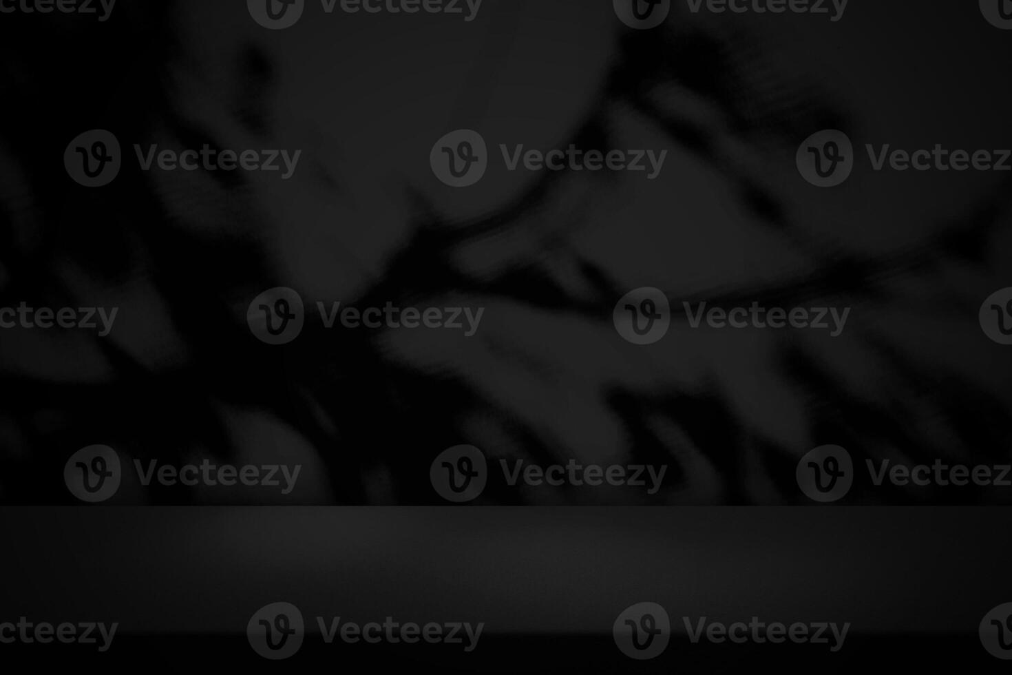 Table with Scary Tree Shadow on Concrete Wall Texture Background in Dark Tone, Suitable for Product Presentation Backdrop, Display, and Mock up for Halloween Concept. photo