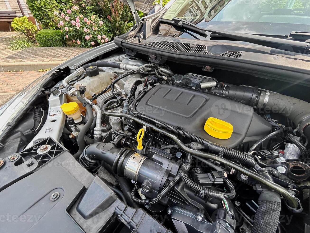 A Detailed View of a Contemporary Automotive Engine Compartment Showcasing Its Efficient Design and HighQuality Components That Contribute to Enhanced Performance and Improved Functionality photo