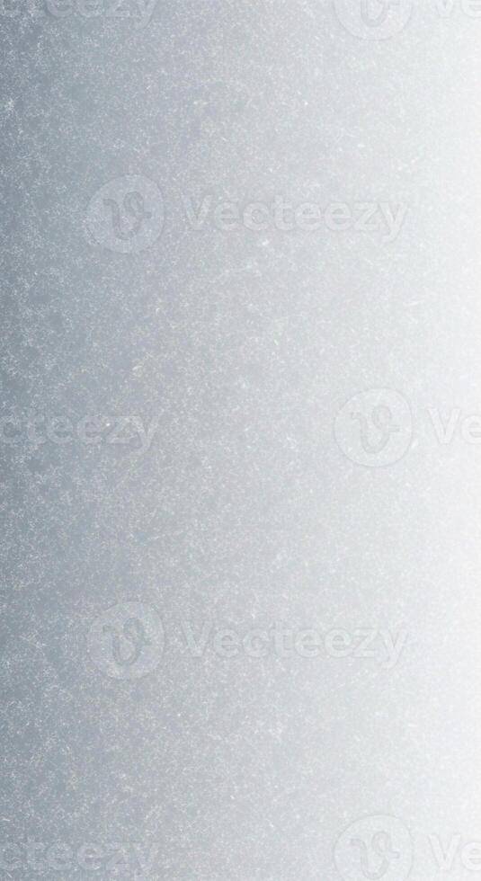 Subtle gradient texture of faded blue and white creating a soft and airy background effect photo