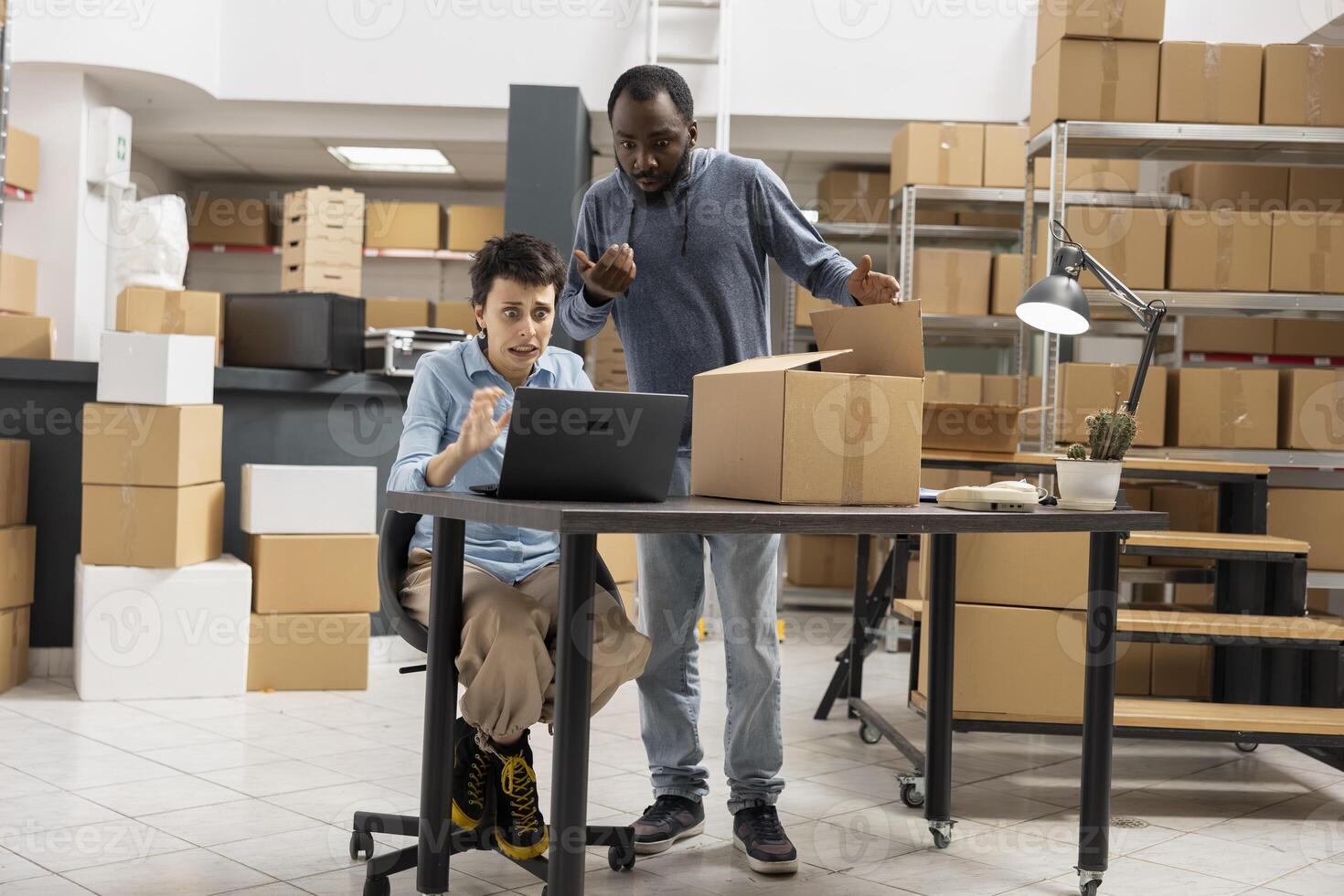 Diverse workers team confused and furious due to custom orders mix up, trying to solve the failure and ship the merchandise for distribution activity. Struggling with delivery business operations. photo